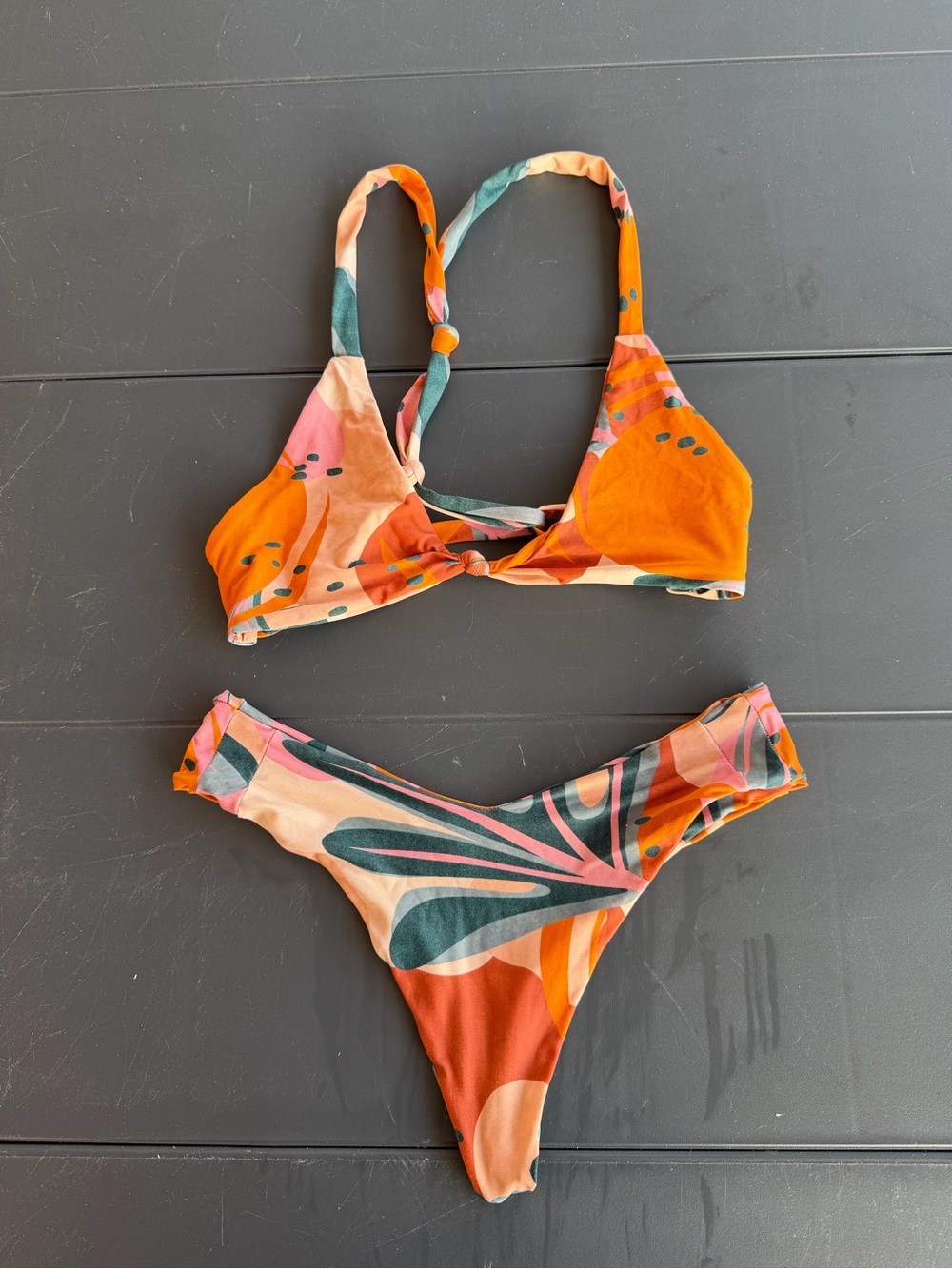 AVAILABLE: Stone Fox Swim Orange & Multicolor Abstract Bikini Set
